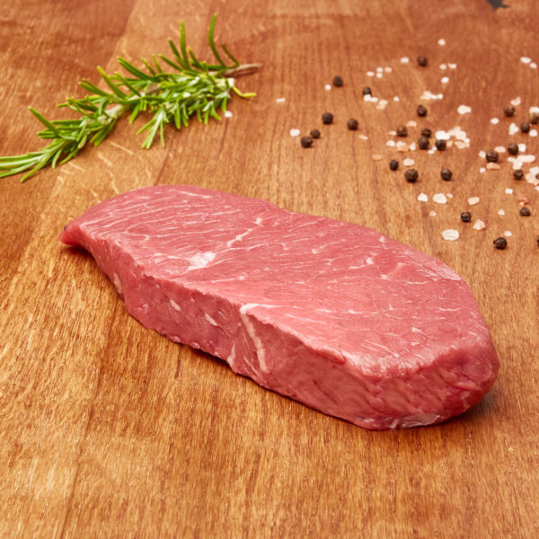 Frisches Bio Rinder Steak ganiert mit Salz Pfeffer und Thymian